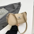 Beige litchi grain shoulder bag with silver turn-lock and adjustable strap for women - Khaki