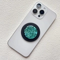 Macro detail of green glitter magnetic phone socket on a white smartphone back - Magnetic Stand / Green
