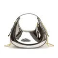 Detail of silver crescent hobo bag with glossy mirror finish and gold chain strap - Large / Silver