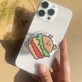 Dettaglio del supporto per telefono in acrilico a forma di hamburger su uno smartphone - Supporto Magnetico / Hamburger