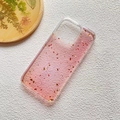 Detail of pink gradient iPhone case featuring embedded gold foil flakes and glitters - Tender Peach / Model 13