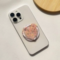 Macro view of heart-shaped glitter phone grip with pink sequins on a white smartphone - Magnetic Stand / Orange Heart - Heart Shape