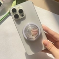 Details eines glitzernden Sternenhimmel-Handyhalters mit rosa Planet und Sternbildern - Mars - Transparent