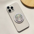Macro detail of round magnetic phone holder with iridescent heart sequins on white smartphone - Magnetic Stand / Translucent Heart - Round Shape