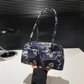 Gothic floral skull print shoulder bag in dark blue with dual buckle front pockets - Blue