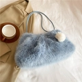Chic light blue faux fur handbag with a white pompom detail and slim shoulder strap - Blue