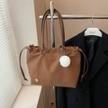 Lightweight brown nylon tote bag with drawstring closure and white pompom charm - Caramel color