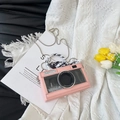 Pink camera-shaped crossbody bag with chain strap and silk scarf handle detail - Nude Pink