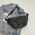 Dark green leopard print fanny pack with adjustable strap on denim jacket background - Green Leopard