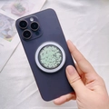 Détail du support magnétique pailleté avec paillettes vertes sur dos d'iPhone - Support Magnétique / Paillettes Vert Clair