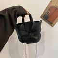 Elegante bolso de mano negro con forma de flor para mujer y cadena plateada al hombro - Negro