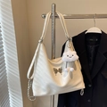 Off-white faux leather hobo shoulder bag with silver butterfly buckle and cloud charm - Off White