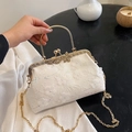 White lace evening bag with floral embroidery, sequins, and golden metal ring handle - White