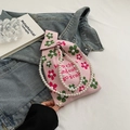 Borsa a secchiello in maglia rosa con motivi floreali e tracolla in perle eleganti - Rosa