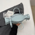 Light blue bow-shaped PU leather handbag with silver hardware and adjustable shoulder strap - Blue