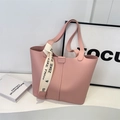 Pink tote bag with lychee texture and branded ribbon for stylish commuting - Pink