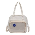 Vielseitige cremeweiße Canvas-Tragetasche mit Netztasche und verstellbarem Schultergurt - Gebrochenes Weiß