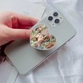 Heart-shaped expanding phone grip with iridescent natural abalone shell on a smartphone - Abalone Shell With White Base