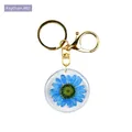 Blue dried daisy flower resin keychain with golden metal ring and lobster clasp - Blue Dried Flower Style (B02)