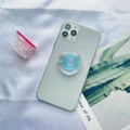 Blue gradient telescopic phone grip holder shown on a minimalist tropical background - White & Blue Gradient