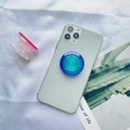 Blue and pink gradient telescopic air bag phone stand on a mint green smartphone - Blue Blue Gradient