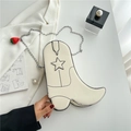Chic beige cowboy boot-shaped crossbody bag with star patches and strawberry charm - White