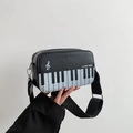 Black piano keyboard crossbody bag with I LOVE MUSIC embroidery and wide strap - Black