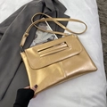 Elegant champagne gold envelope clutch bag with pleated texture and silver metal hardware - Gold