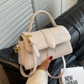 Chic cream white flap square handbag with golden hardware and adjustable crossbody strap - Off-white