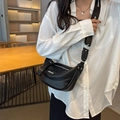 Black crescent crossbody bag with lychee texture and wide branded strap for women - Black