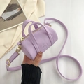 Mini lavender purple barrel crossbody bag in pebble grain leather with gold hardware - Purple