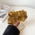 Mini gold sequin shoulder bag with elegant chain strap for women shown in hand - Gold