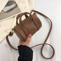 Compact brown lychee texture barrel handbag with gold hardware and removable strap - Brown