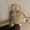 Handwoven straw bucket bag with shell decor and leather strap for summer beach vacation - Beige