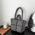 Grey quilted puffer tote bag with large square pattern and soft padded top handles - Gray