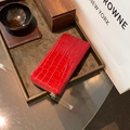 Minimalist red long wallet with embossed crocodile texture and secure zipper closure - Red