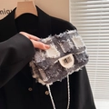 Quilted gray denim chain bag with frayed edges and metal clasp on black blazer - Black White Grey Plaid (5287629283526) / Black