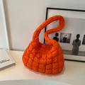 Bright orange quilted cloud bag with padded texture and glossy nylon finish - Orange