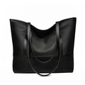 Grande borsa tote nera in tessuto Oxford con fondo in pelle e manici rinforzati su sfondo bianco - Nero