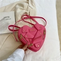 Fashionable heart-shaped biker jacket crossbody bag in vibrant hot pink finish - Pink