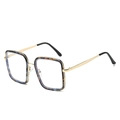 Lunettes de soleil carrées oversize avec monture marbrée bleu et marron et branches dorées - Monture Noire Léopard