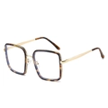 Lunettes de soleil carrées écaille avec touches bleu clair et branches dorées - Cadre Écaille