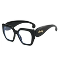 Lunettes de soleil carrées oversize noires tendance avec logo doré sur la branche - Cadre Noir