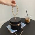 Elegante borsa a cilindro nera con strass scintillanti e manico tondo in perle - Nero