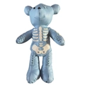 Light blue faux leather bear backpack with white skeleton design and cross-stitch detail - Light Blue