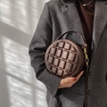 Chocolate brown quilted round handbag with 3D matrix texture and golden hardware - Chocolate