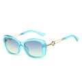 Fashion butterfly frame sunglasses with blue frames and gold metal temples in 45-degree view - Blue Frame Blue Green Lens