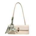 Chic beige crocodile-embossed shoulder bag with gold clasp and decorative green silk scarf - Off-white