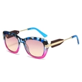 Vintage cat-eye sunglasses with marble frame and gradient lenses in a 45-degree angle view - Blue Leopard Purple Frame Purple Yellow Lens