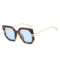 Fashionable oversized tortoise shell sunglasses with light blue lenses and gold metal temples - Tortoise Frame Blue Lens